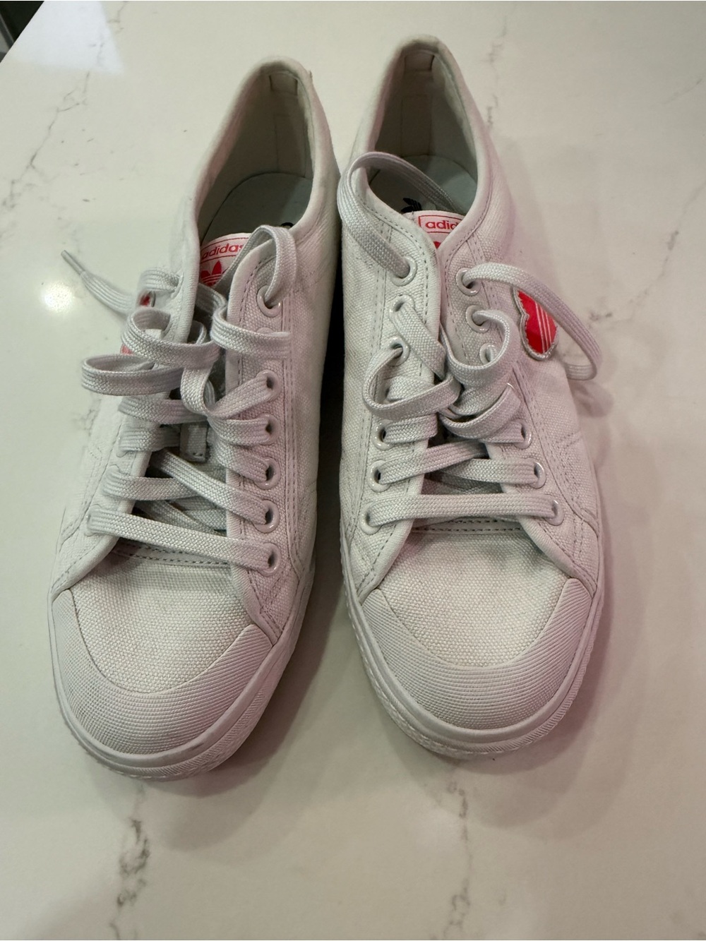 adidas White Canvas Low-Top Sneakers with Red Logo Accents